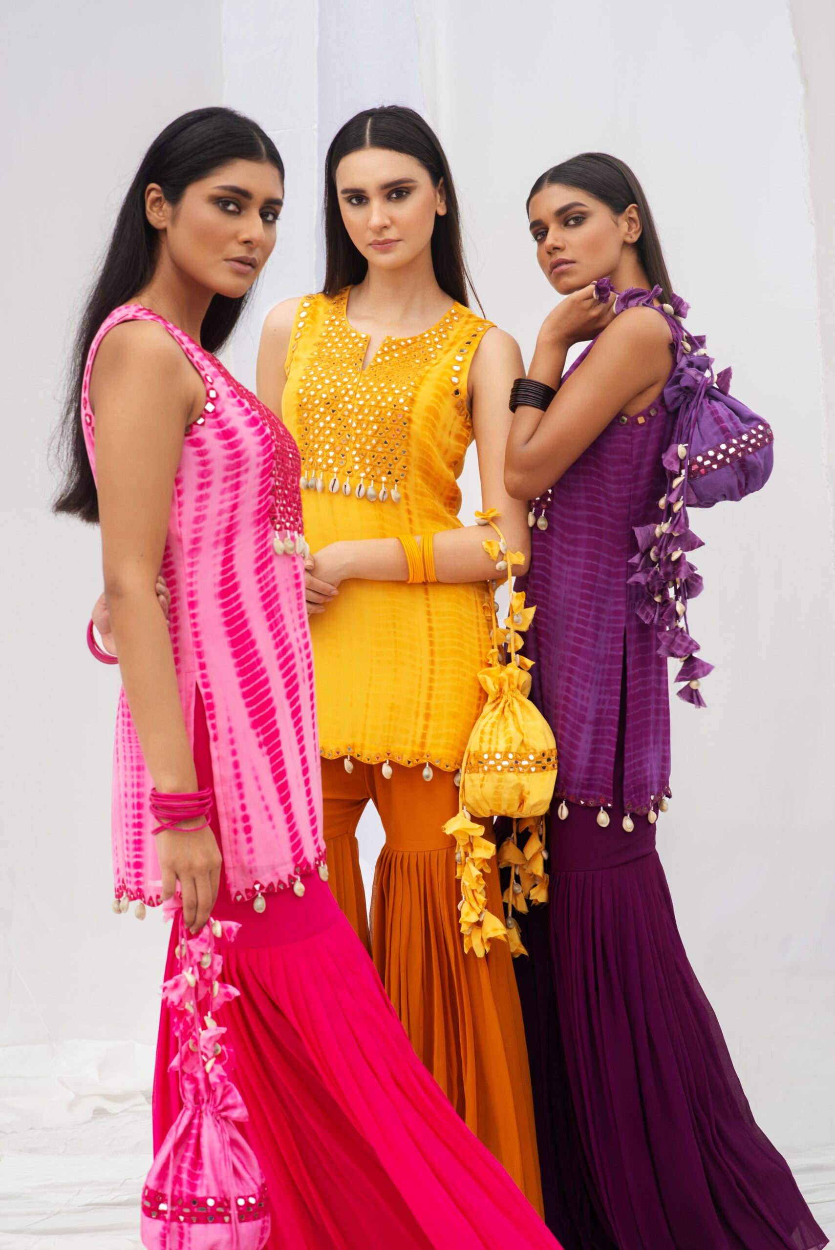 VIBRANT SHORT KURTA PAIRED WITH A STYLISH GARARA AND DUPATTA. - Image 4