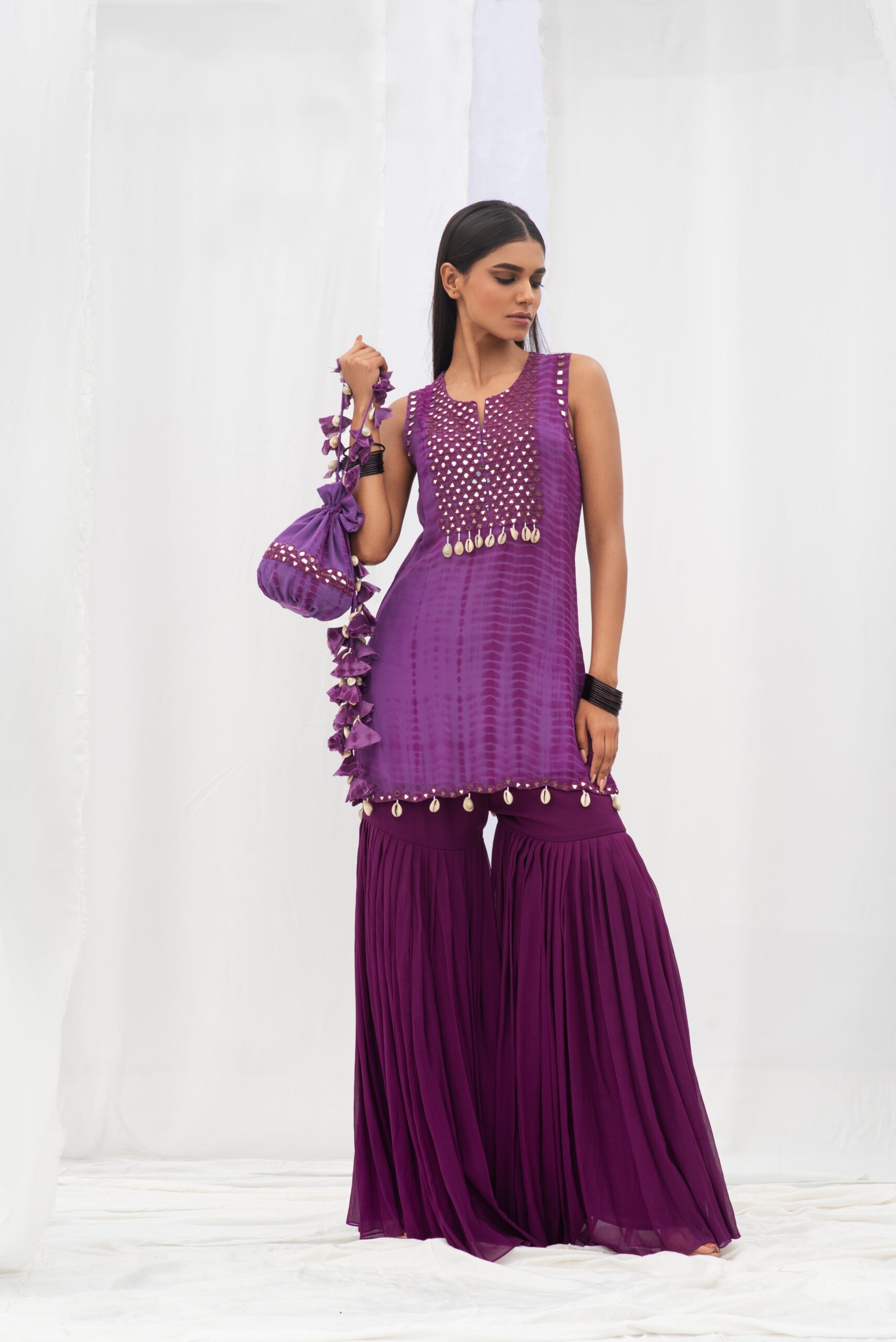 VIBRANT SHORT KURTA PAIRED WITH A STYLISH GARARA AND DUPATTA. - Image 5